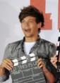/album/galerie-de-photos-louis-tomlinson/one-direction-au-photocall-de-leur-film-1d-this-is-us-a-londres-le-19-aout-2013-portrait-w674-jpg1/
